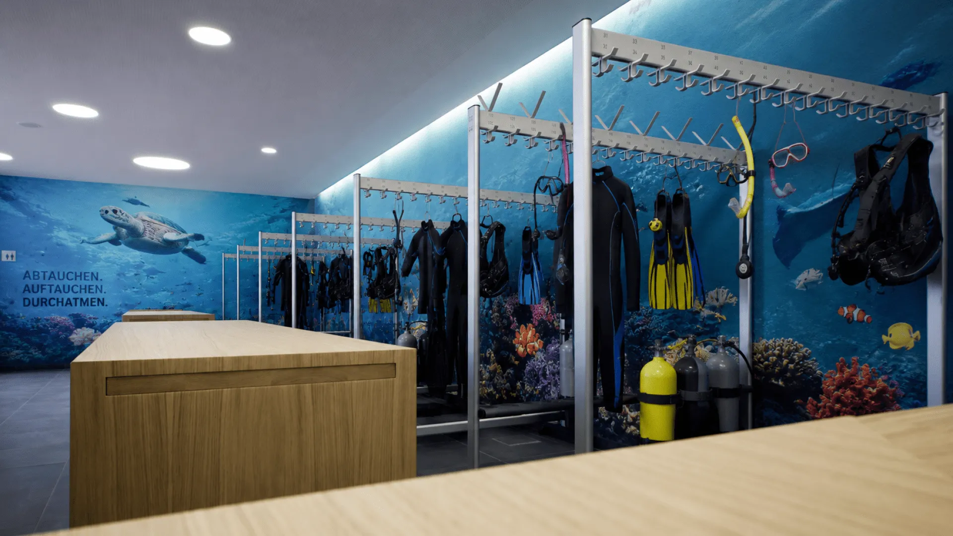 Garderobe mit Tauchanzügen und maritimen Motiven